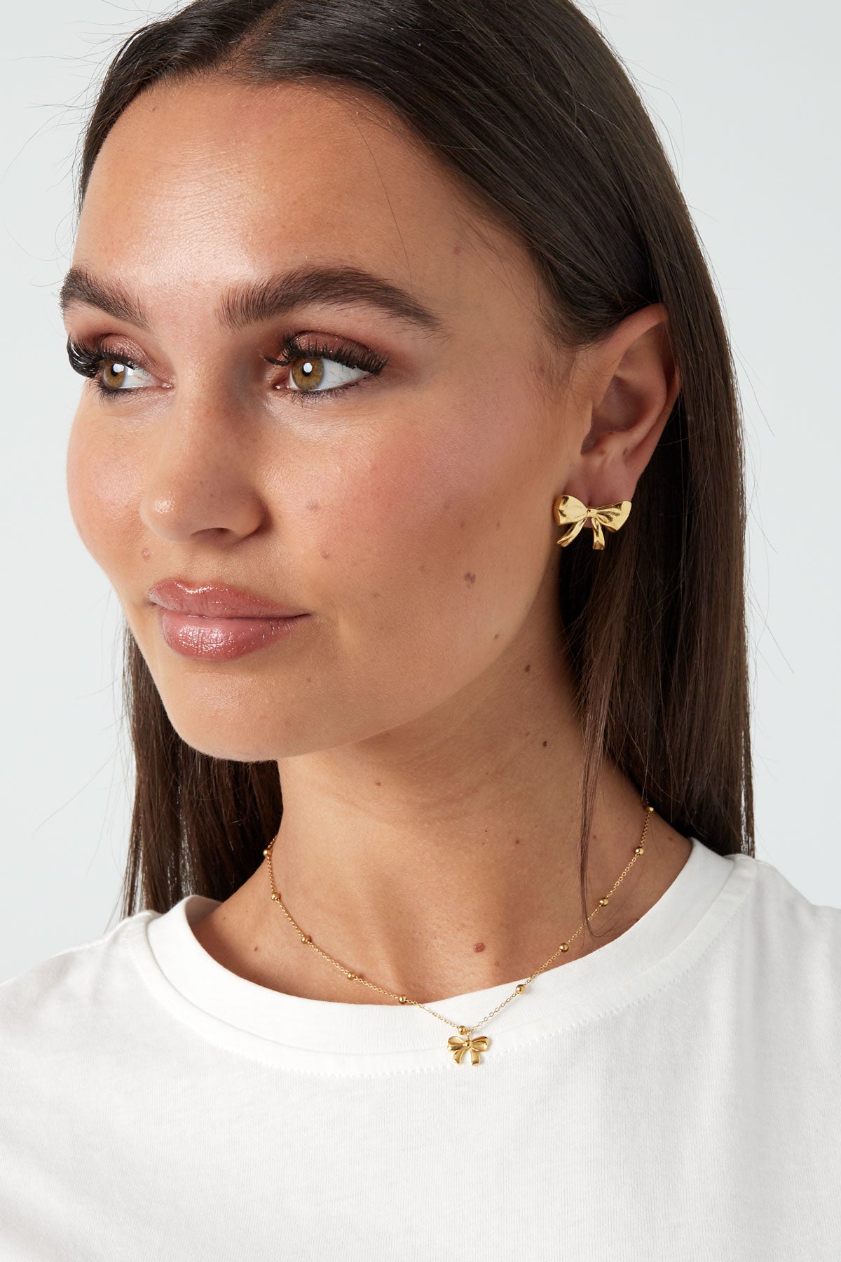 Collier avec boules et noeud - doré