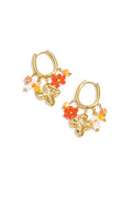 Boucles d'oreilles avec différentes perles pendantes