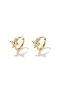 Petites boucles d'oreilles créoles avec des pierres en forme de trèfle