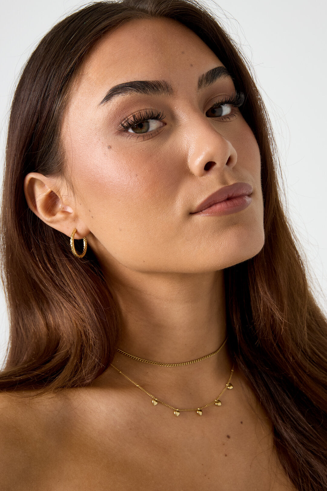 Collier minimaliste à petits cœurs