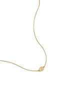 Collier minimaliste avec petit coquillage en spirale