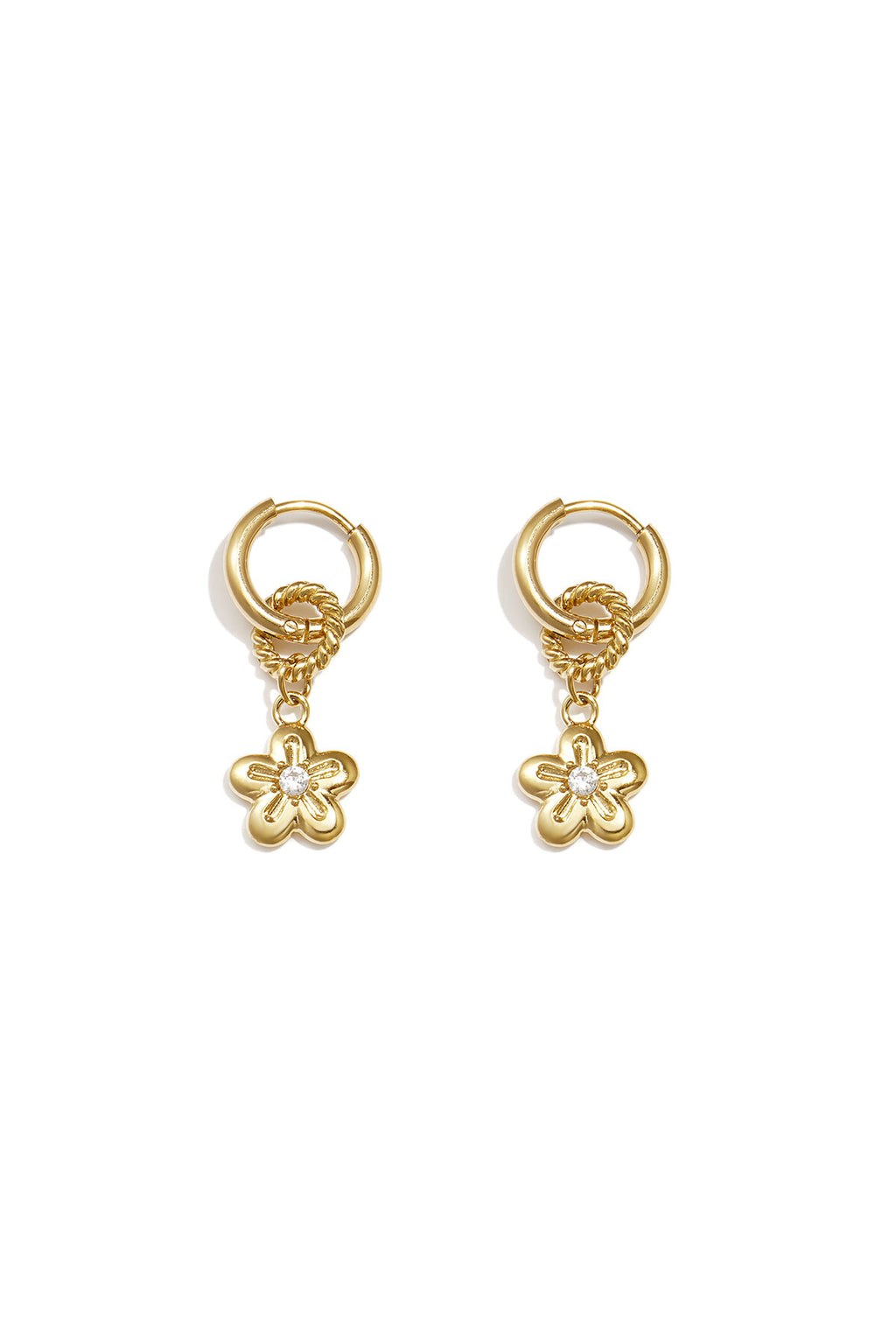 Boucles d'oreilles avec une marguerite pendante