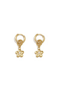 Boucles d'oreilles avec une marguerite pendante