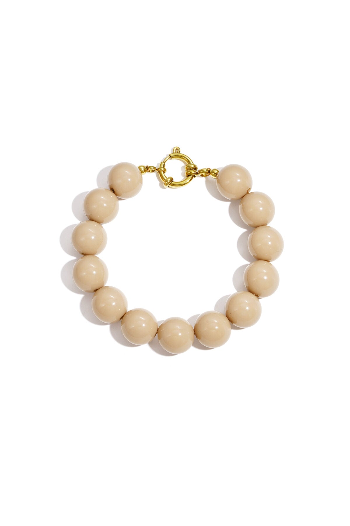 Bracelet à grosses perles et fermoir sur le devant