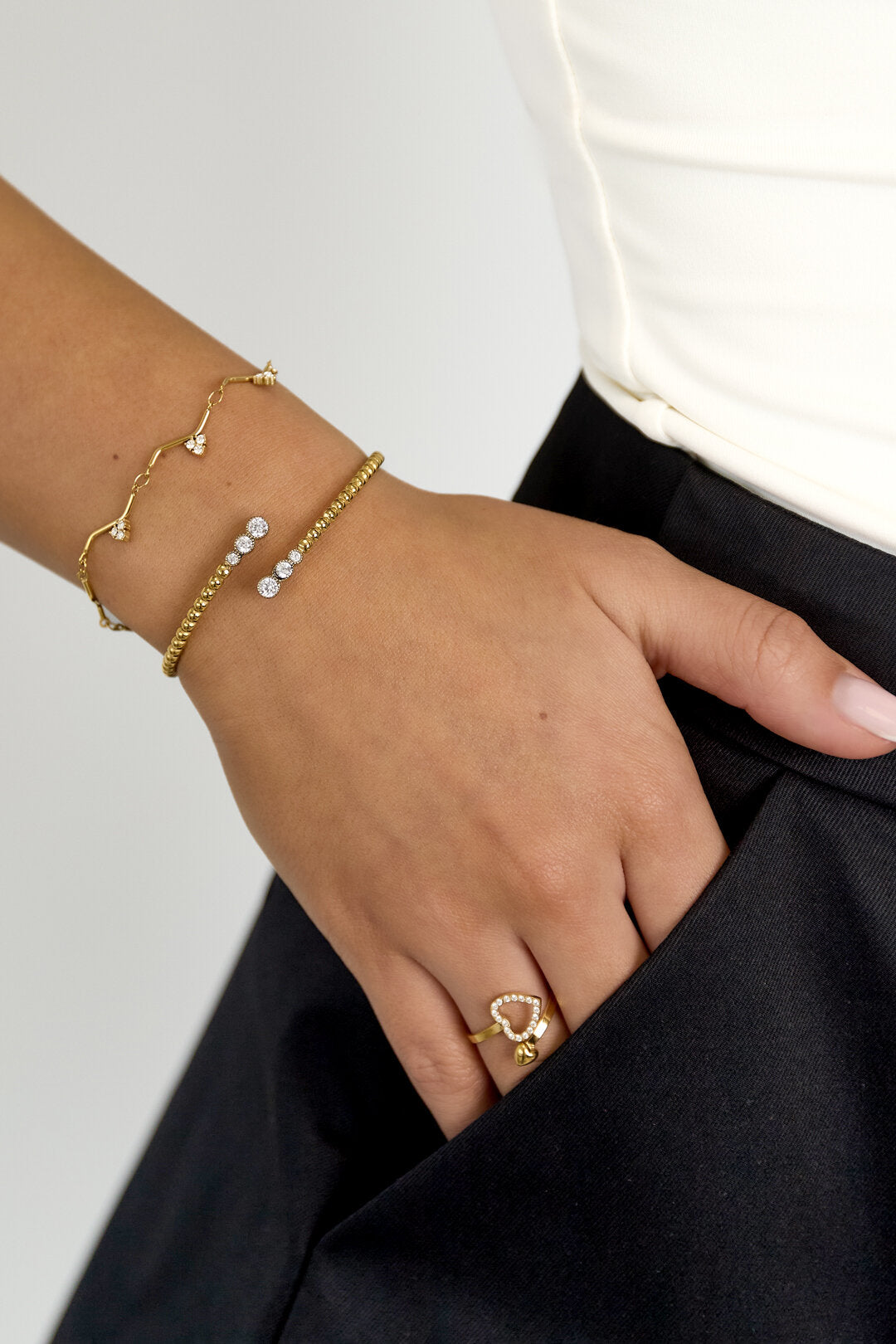 Bracelet à pois symétriques avec extrémités détaillées