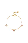 Bracelet orné de pierres roses en forme de cœur