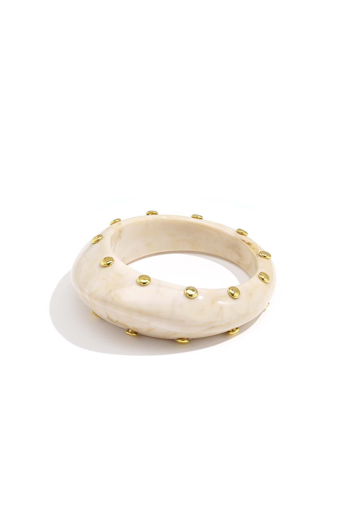 Bracelet jonc en résine avec clous