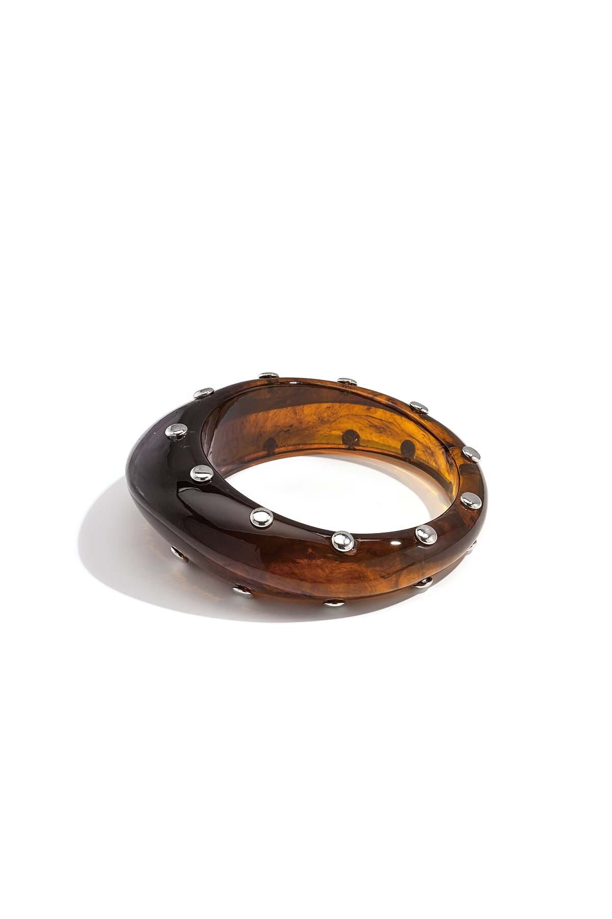 Bracelet jonc en résine avec clous