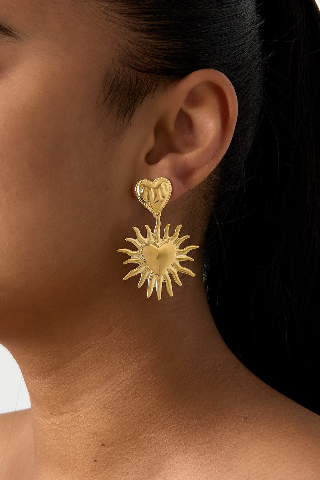 Boucles d'oreilles en forme de cœur avec soleil suspendu