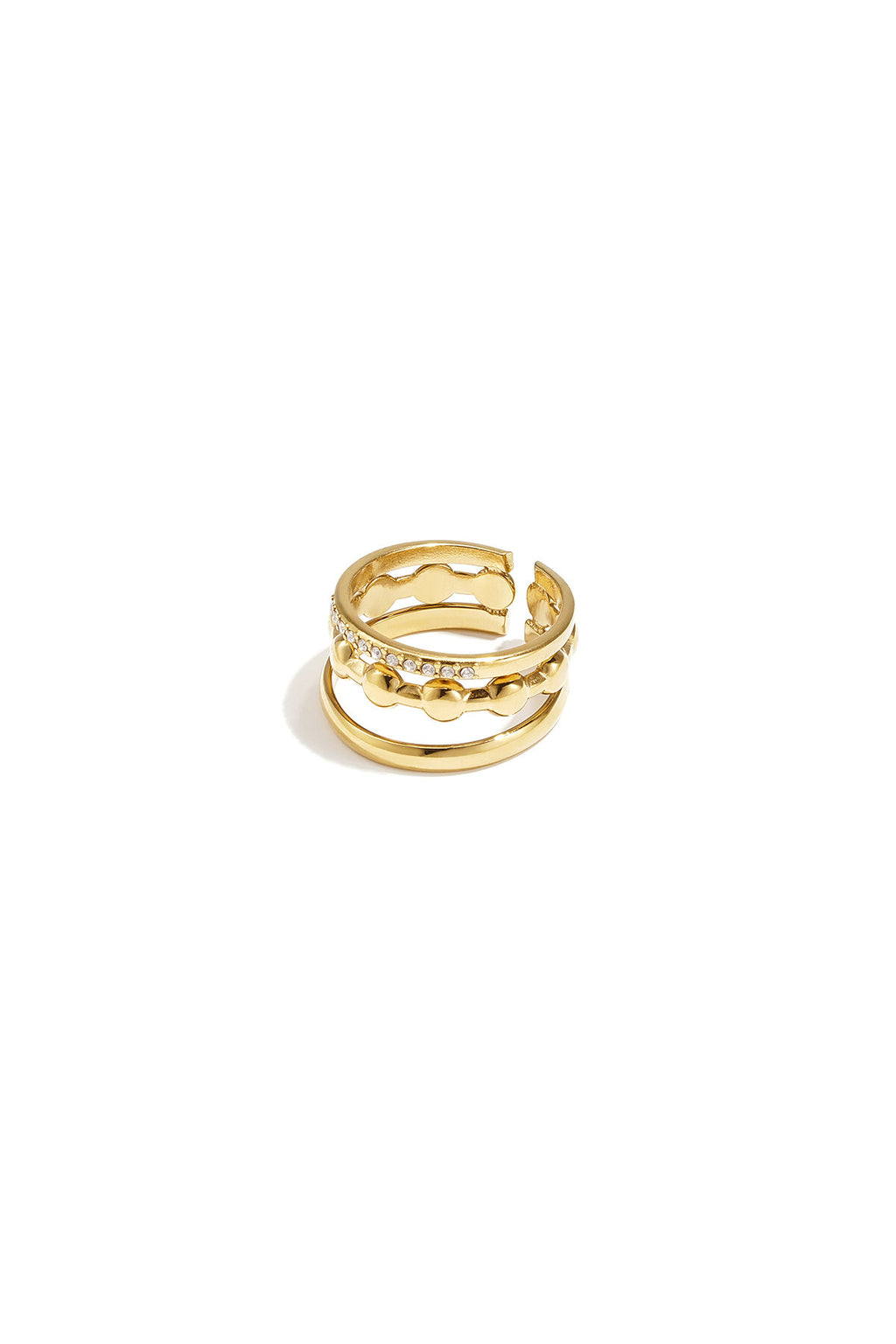 Bague à trois rangs ornée de détails ronds et de pierres