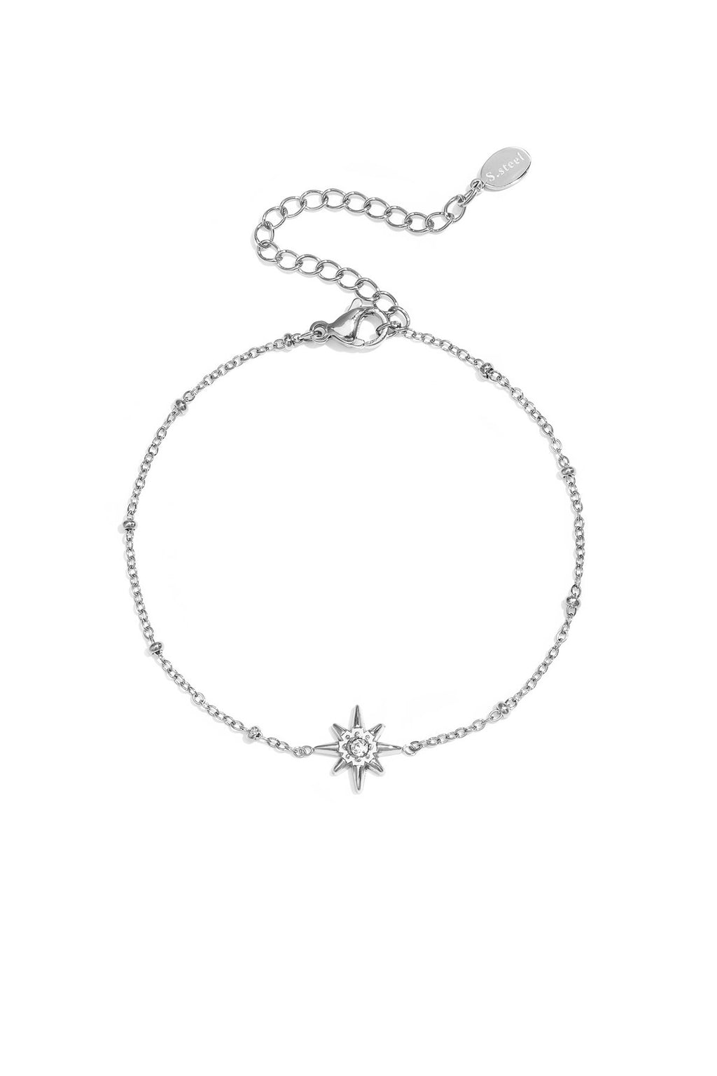 Bracelet orné de perles et d'une étoile filante en pierre