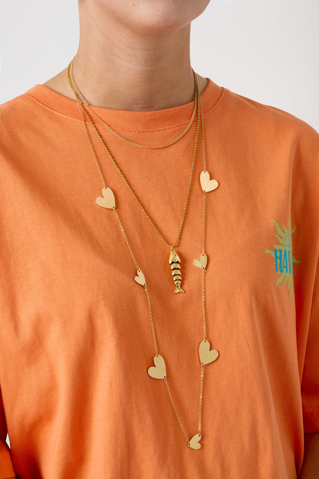 Long collier à cœurs de différentes tailles