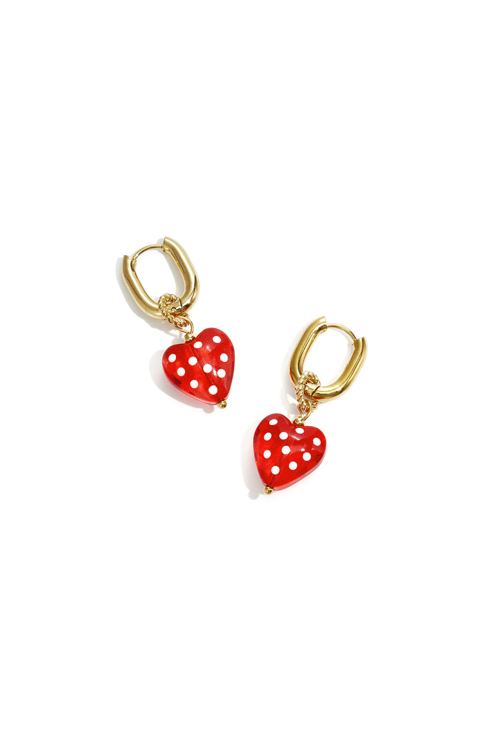 Boucles d'oreilles avec des cœurs pendants à pois