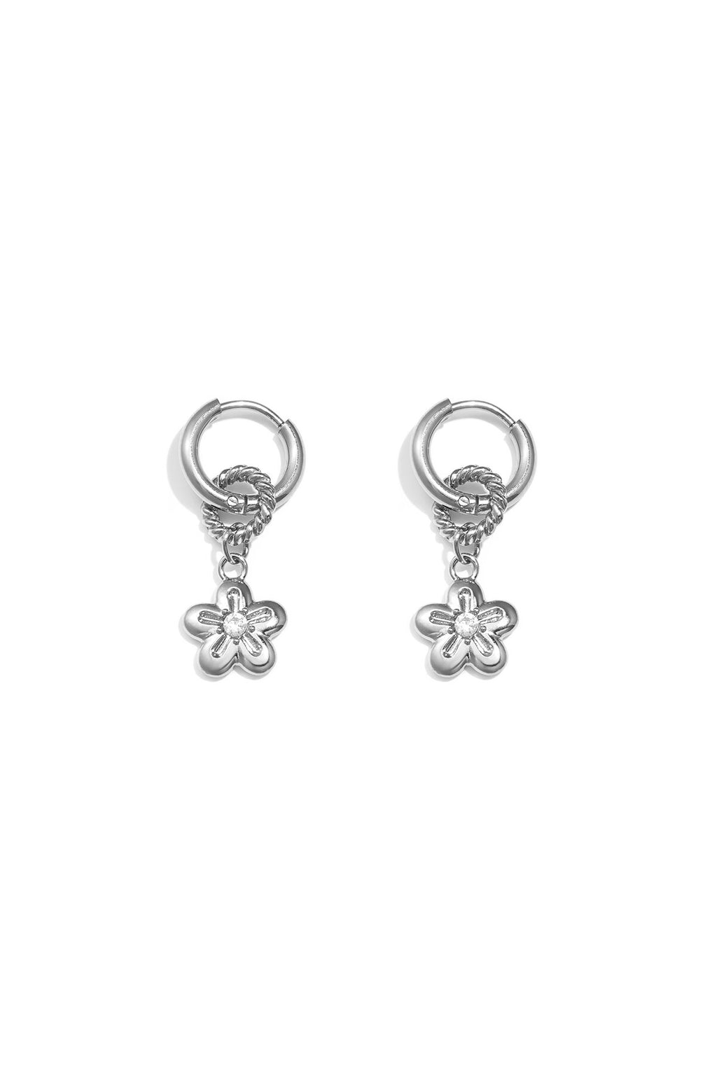 Boucles d'oreilles avec une marguerite pendante