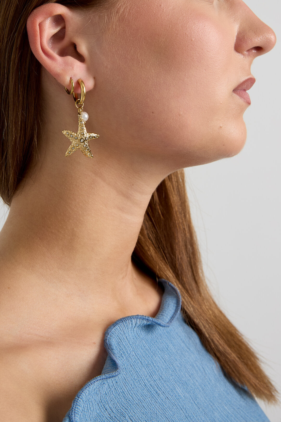 Boucles d'oreilles ornées d'étoiles de mer et de perles