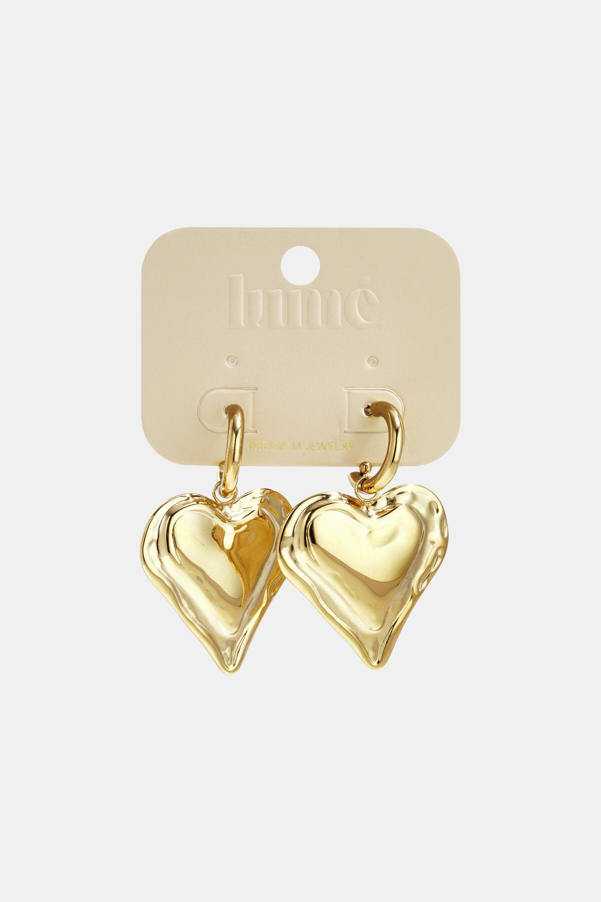 Boucles d'oreilles avec un grand cœur pendant