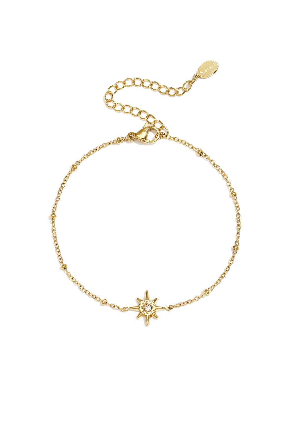 Bracelet orné de perles et d'une étoile filante en pierre