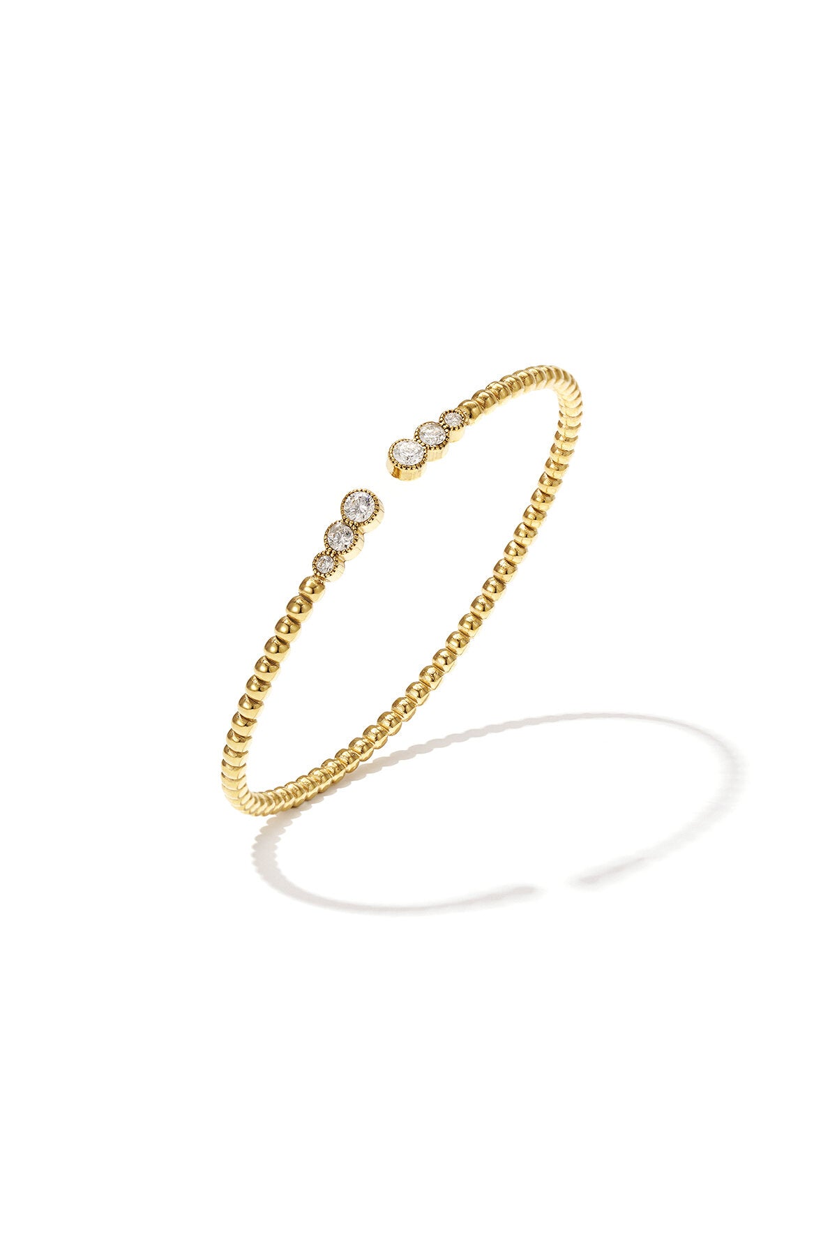 Bracelet à pois symétriques avec extrémités détaillées