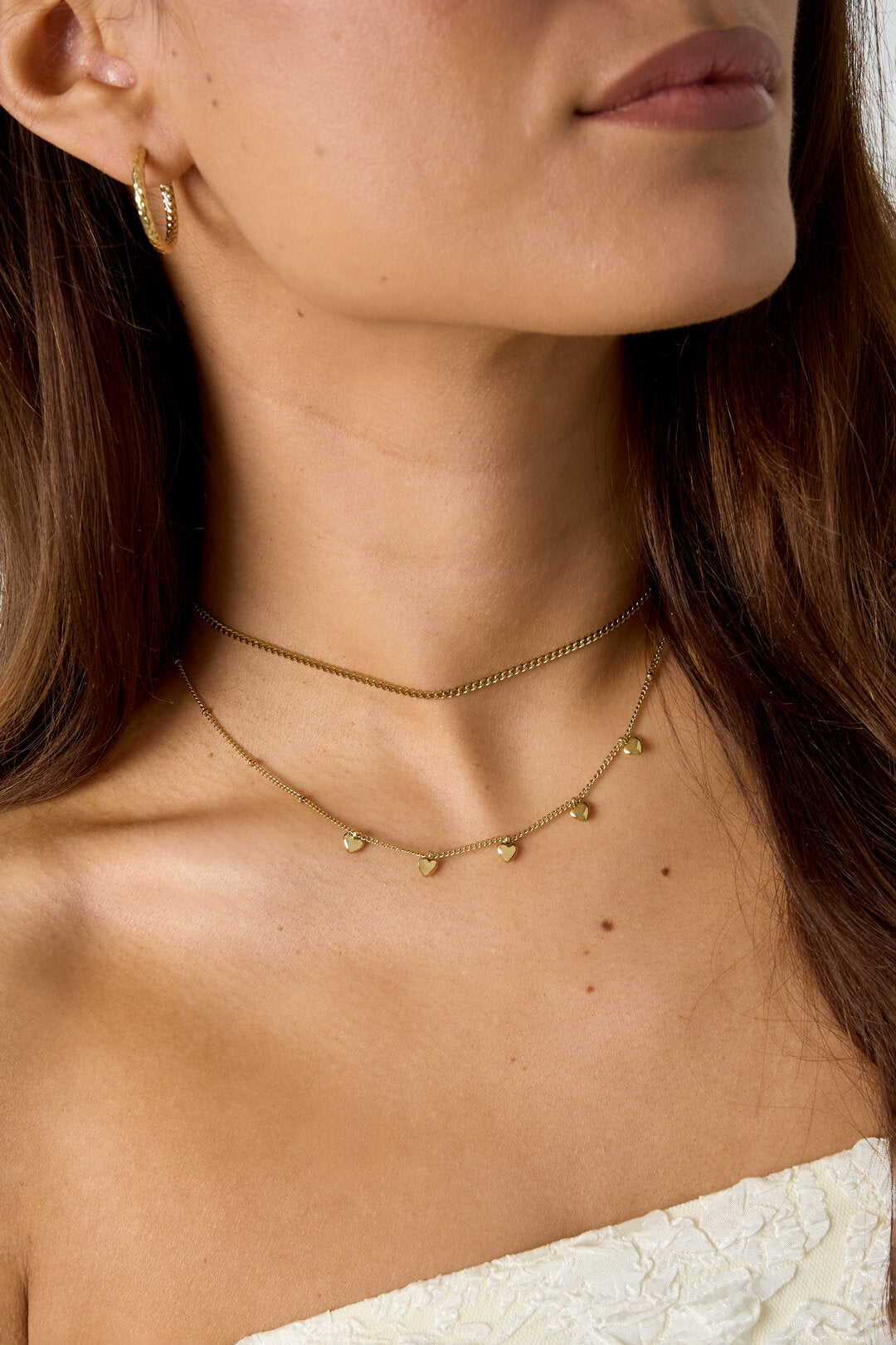 Collier minimaliste à petits cœurs