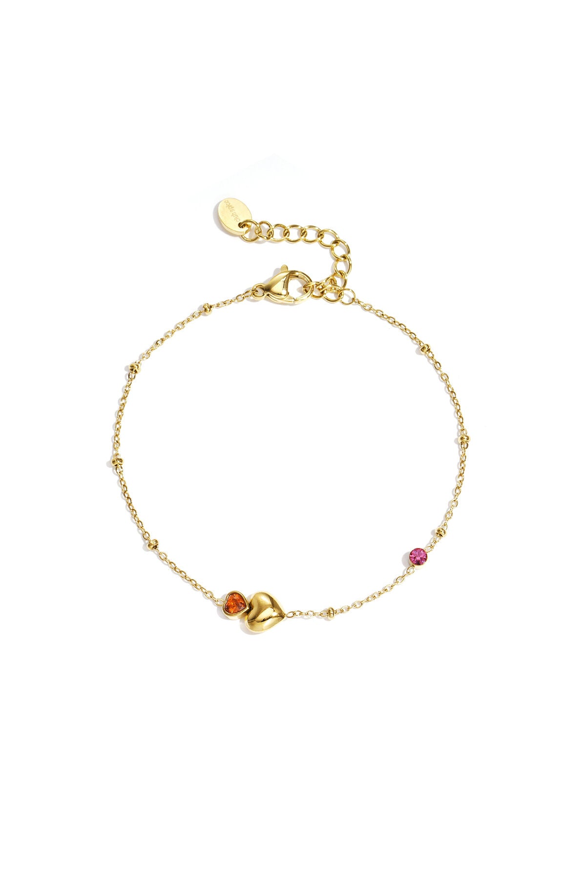 Bracelet orné de cœurs, de pierres colorées et de pois