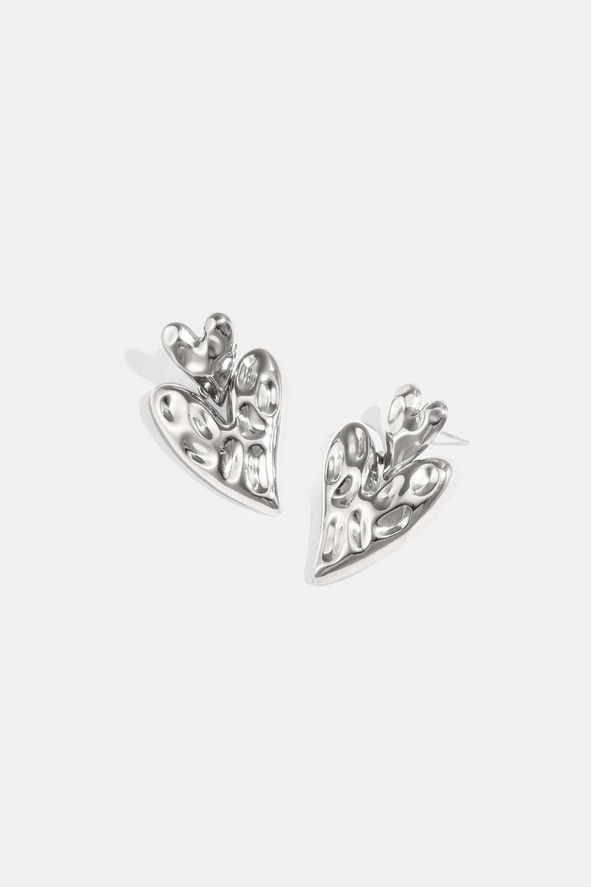 Boucles d'oreilles en forme de cœur superposées