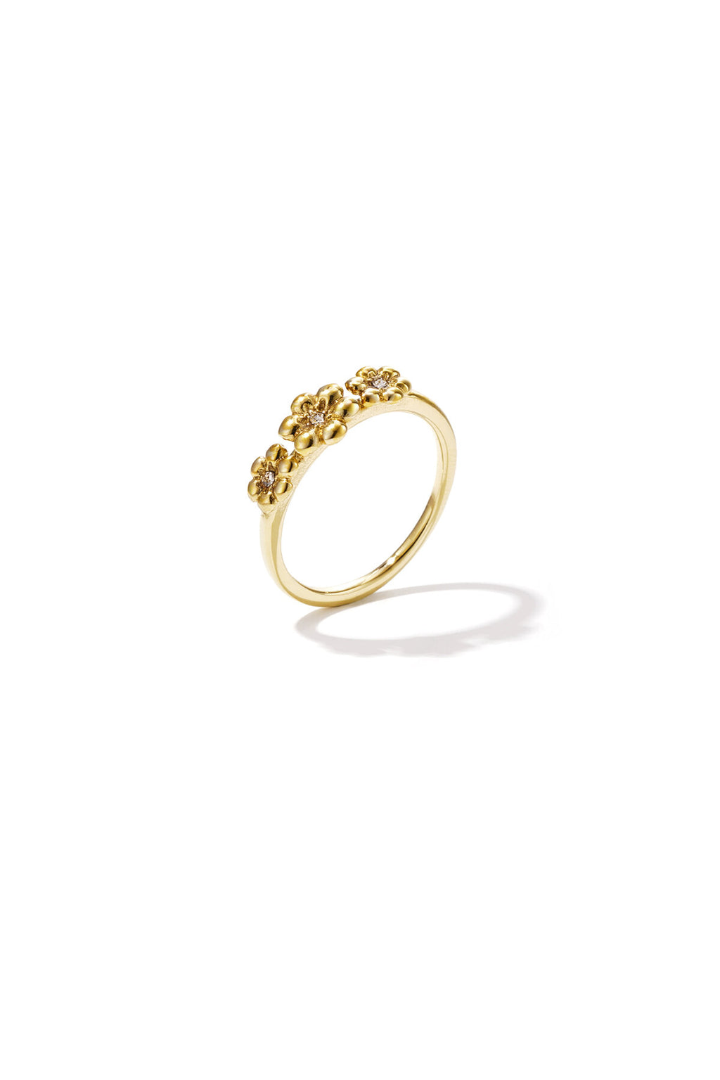 Bague ornée de marguerites et de pierres