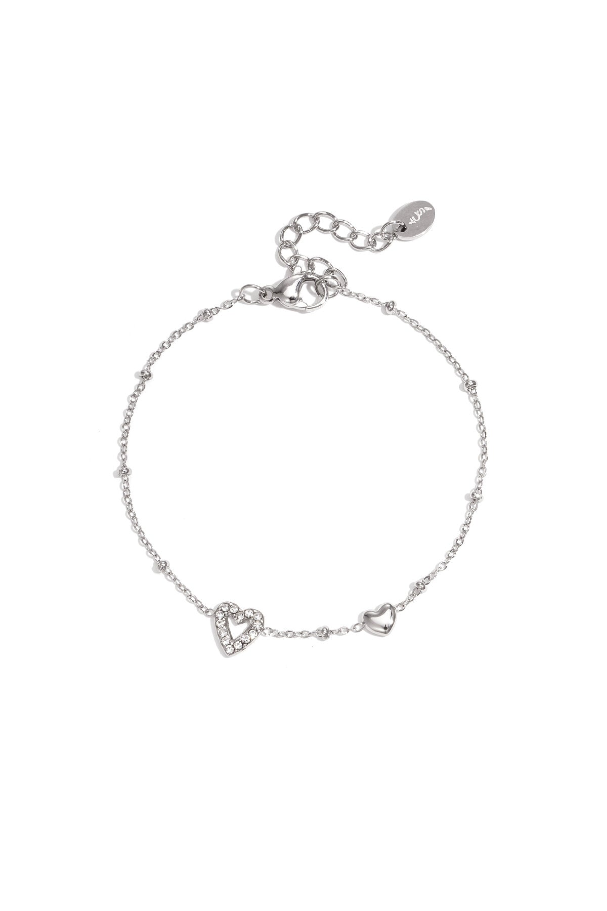 Bracelet orné de cœurs, de pierres colorées et de pois