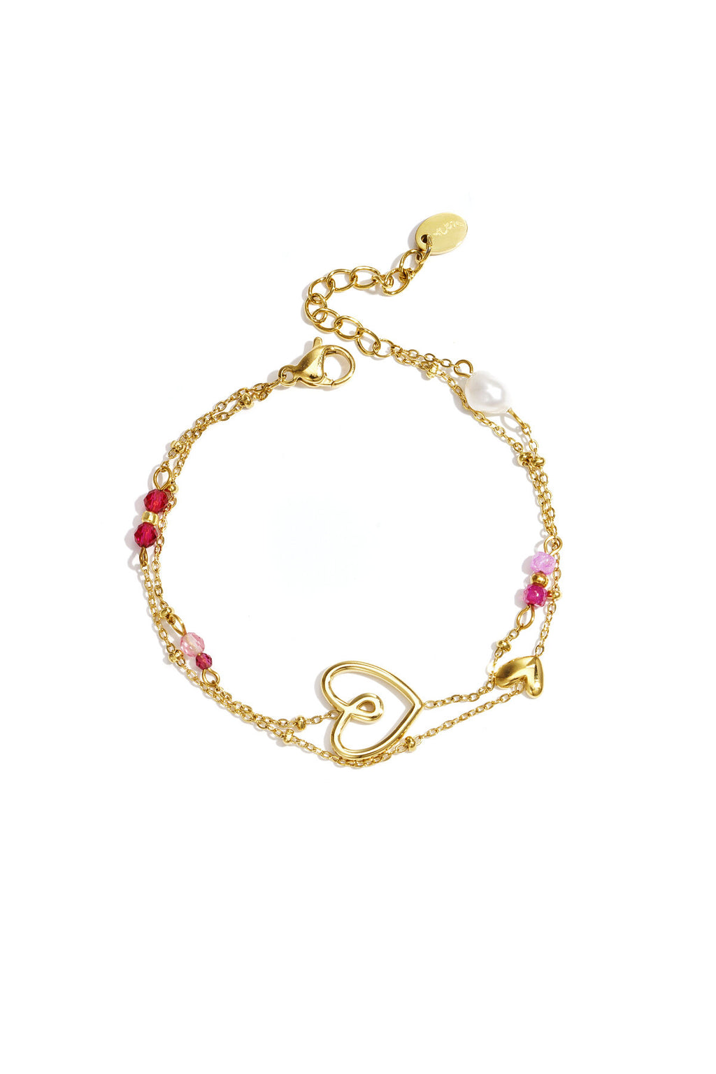 Bracelet orné d'un cœur espiègle, de perles et d'une perle