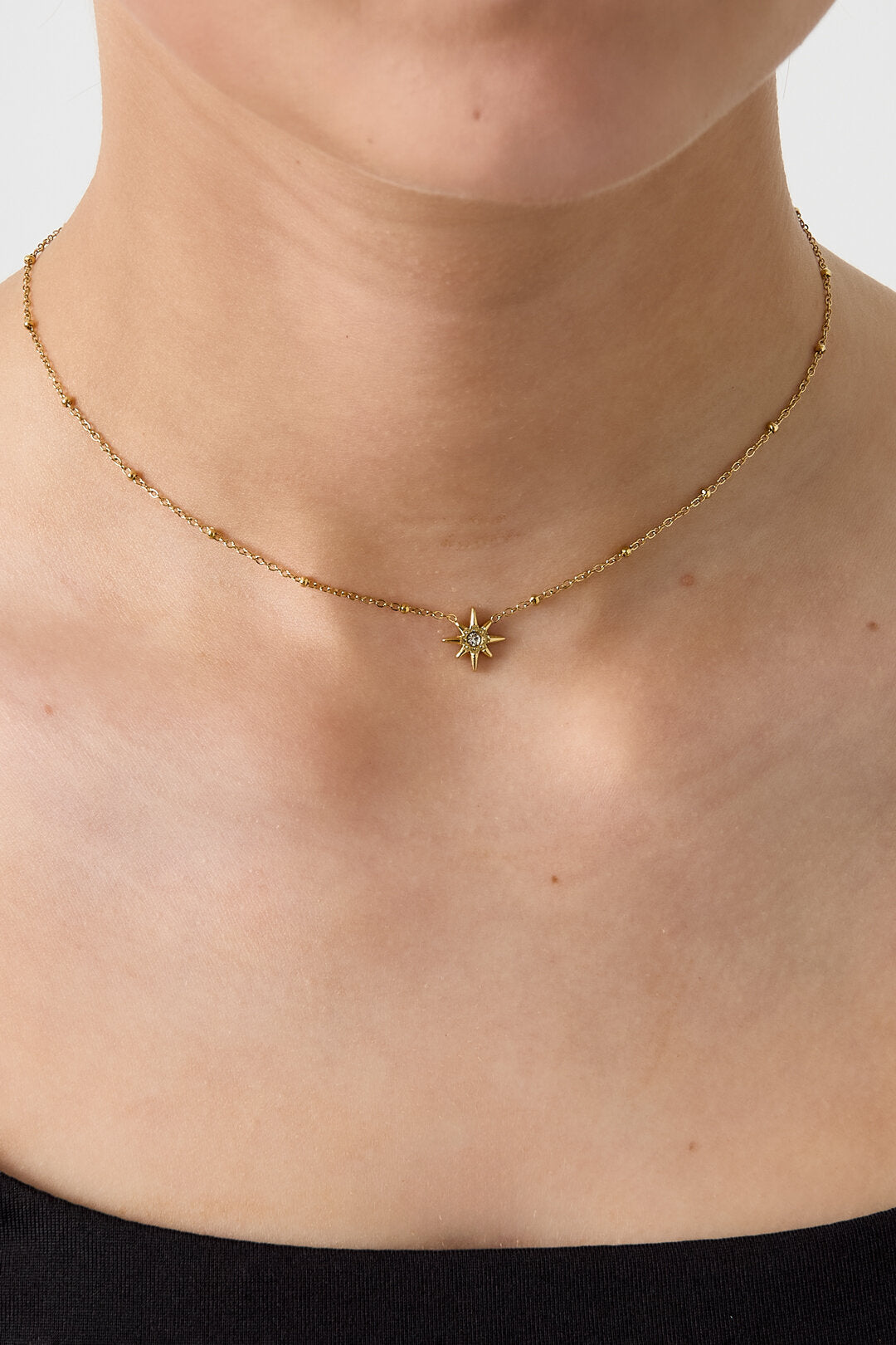 Collier avec perles et étoile filante