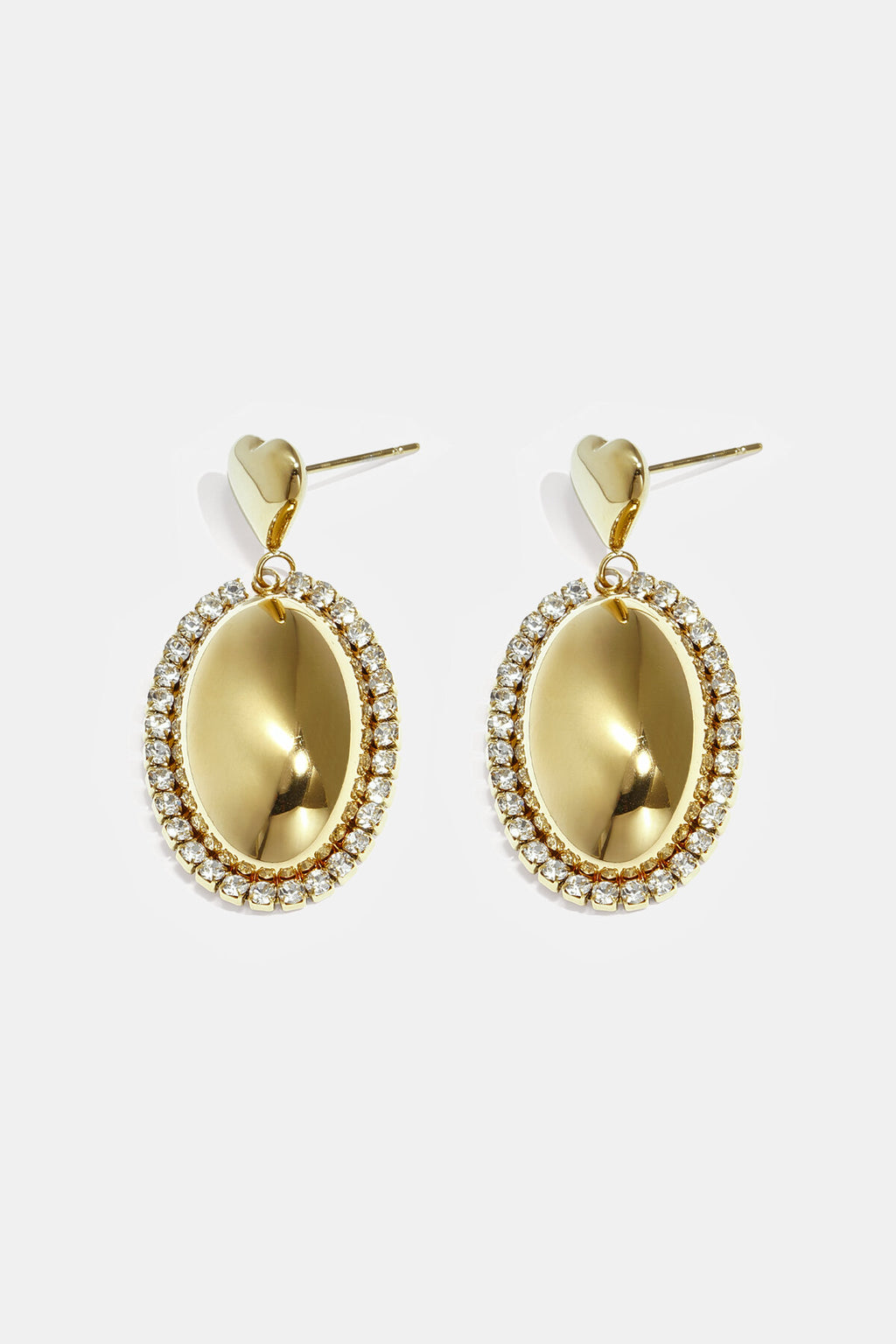 Boucles d'oreilles imposantes avec un pendentif ovale entouré de pierres