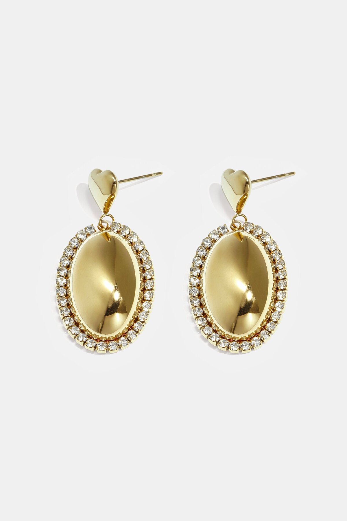 Boucles d'oreilles imposantes avec un pendentif ovale entouré de pierres
