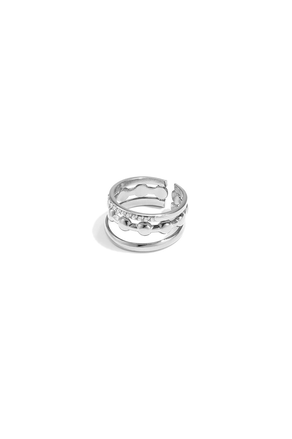 Bague à trois rangs ornée de détails ronds et de pierres