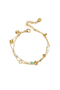 Bracelet orné de trèfles, de perles et de pierres